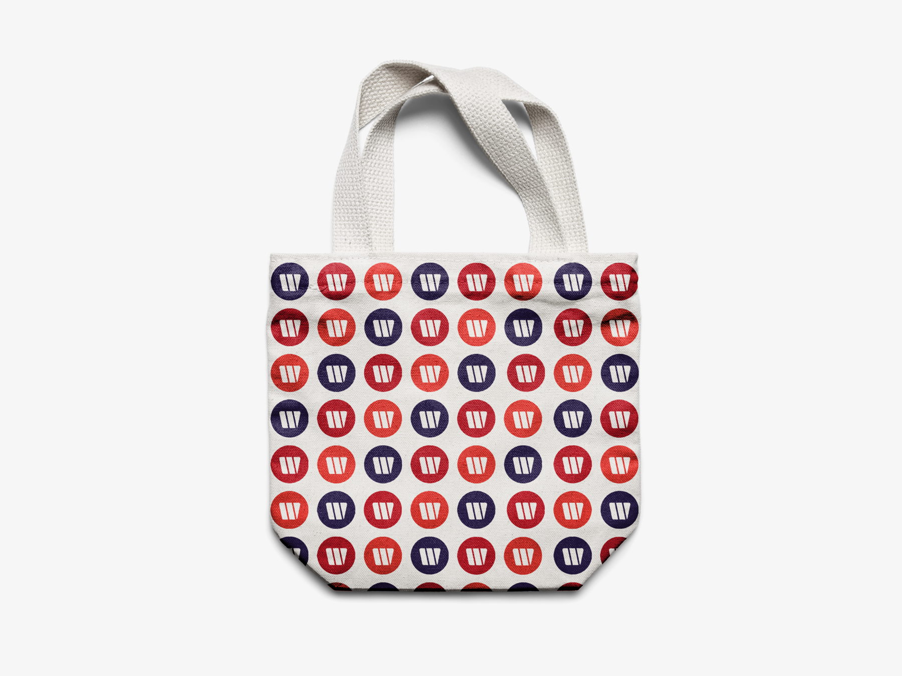 Wirtschaftsbund Stofftasche mit Muster bestehend aus orangen, roten und violetten Icons.
