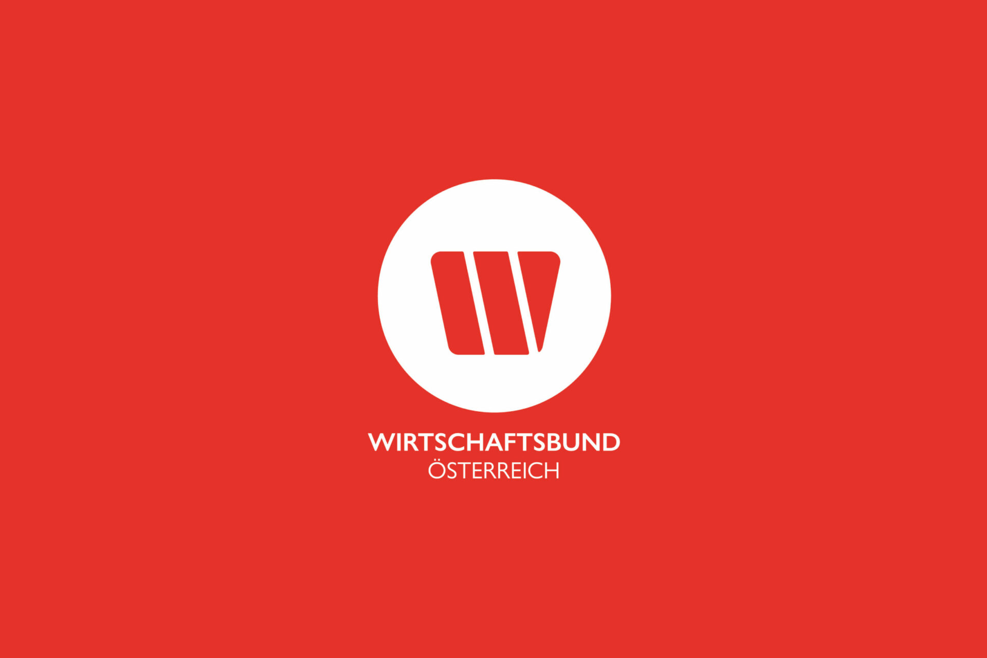 Das neue Wirtschaftsbund Logo in weißer Farbe auf orangefarbenem Hintergrund.